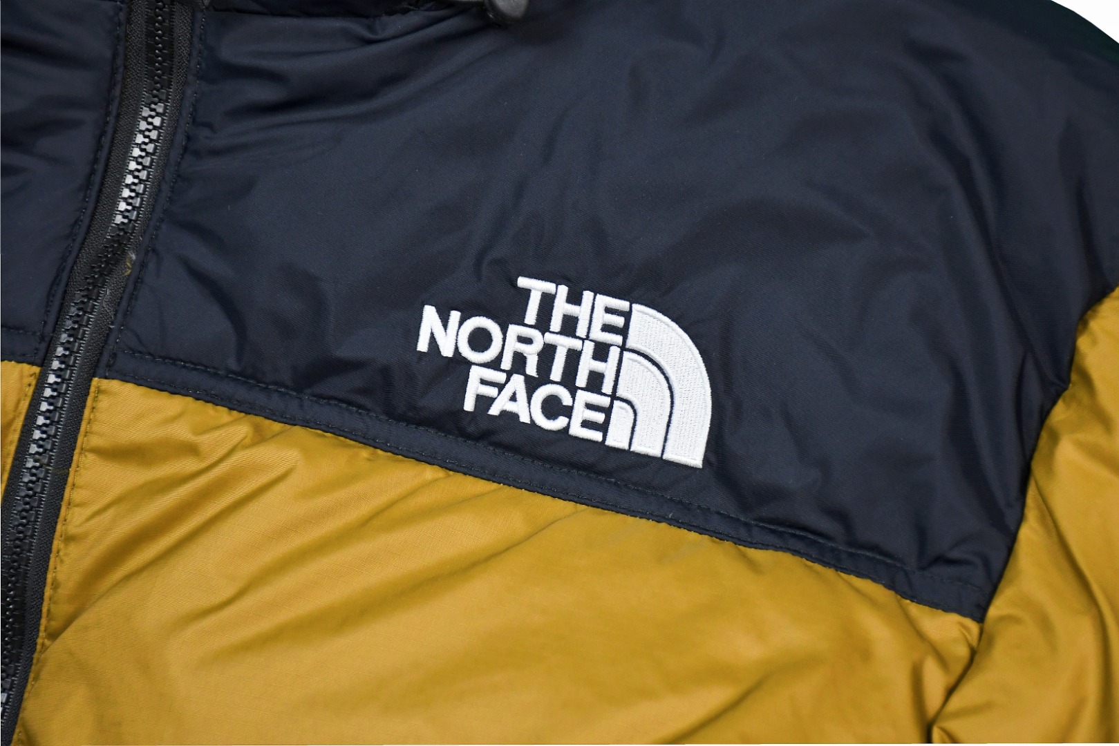 the n0*h f**e t*f  1996 down jacket gold