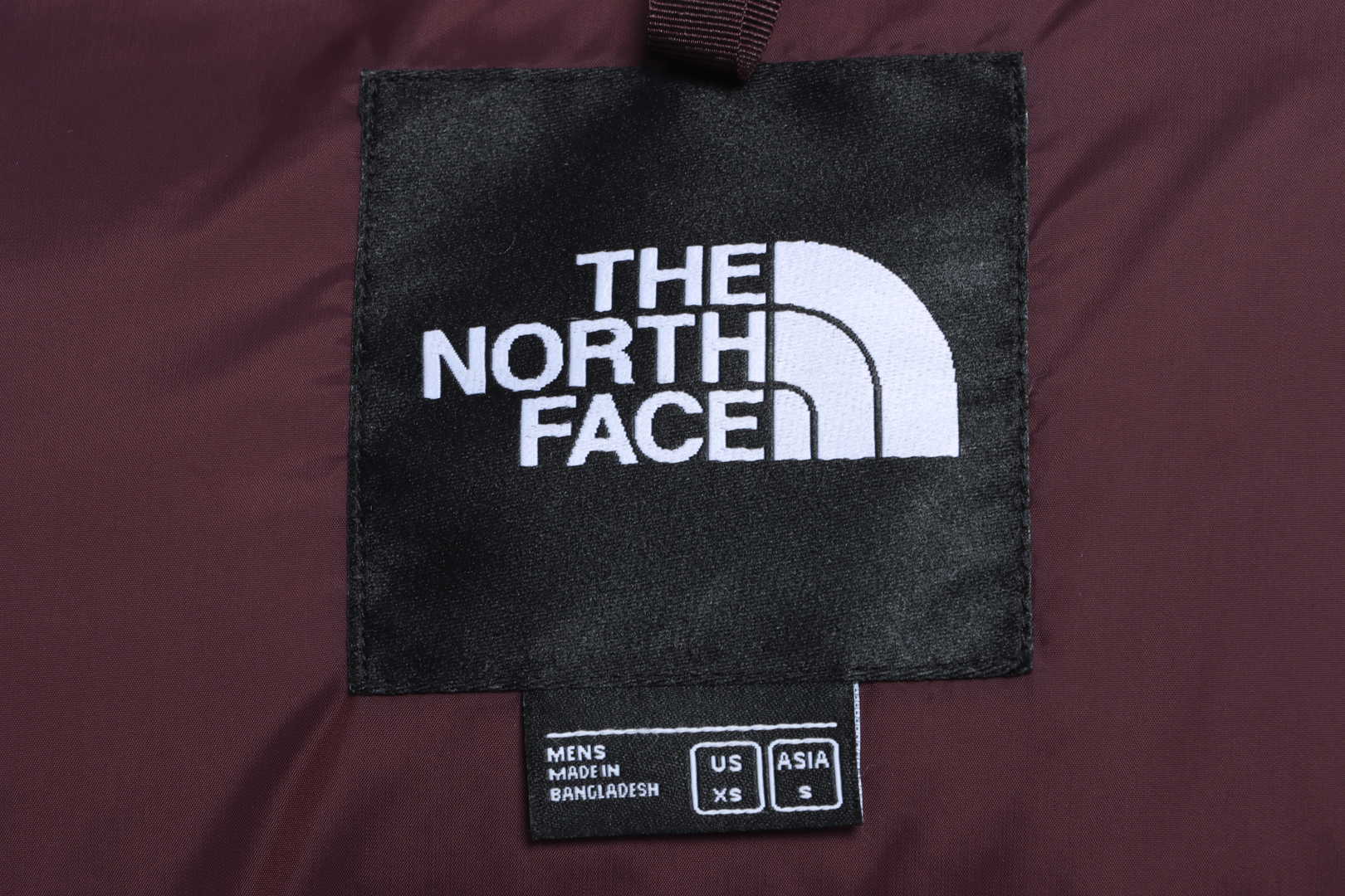 the n0*h F**e 96 red-brown down jacket
