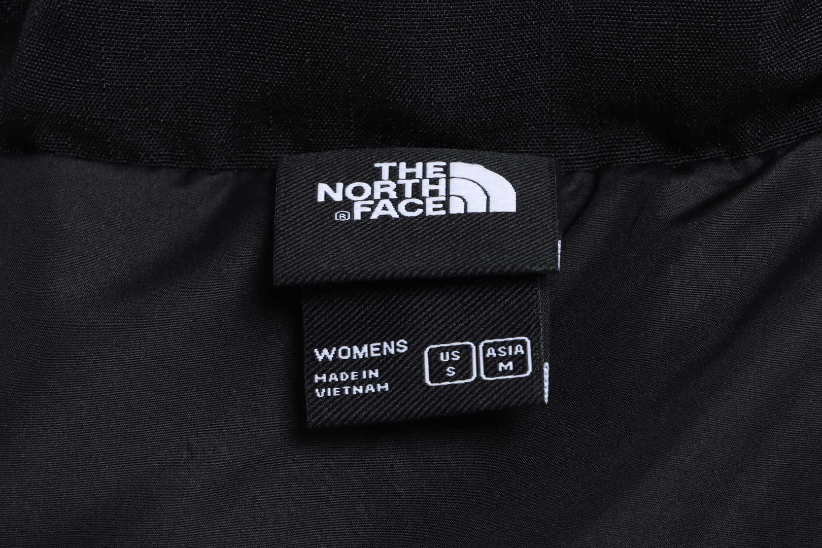 the n0*h F**e splicing contrast color large pocket functional down jacket