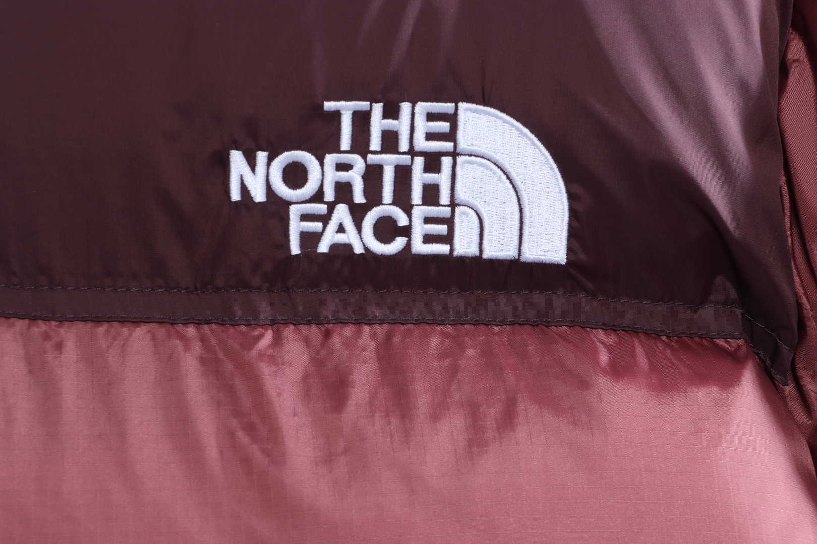 the n0*h F**e 96 red-brown down jacket