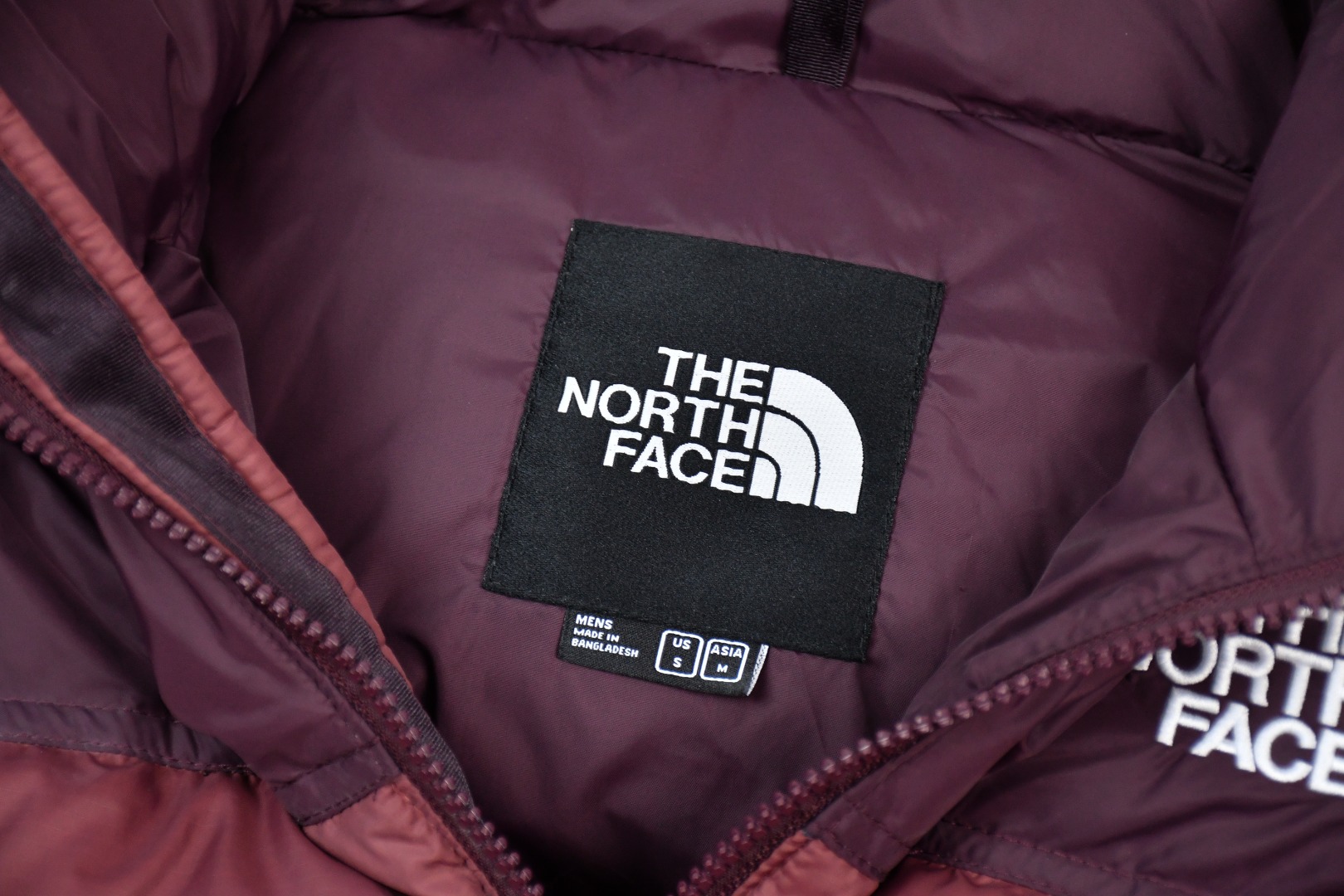 the n0*h f**e t*f  1996 down jacket burgundy