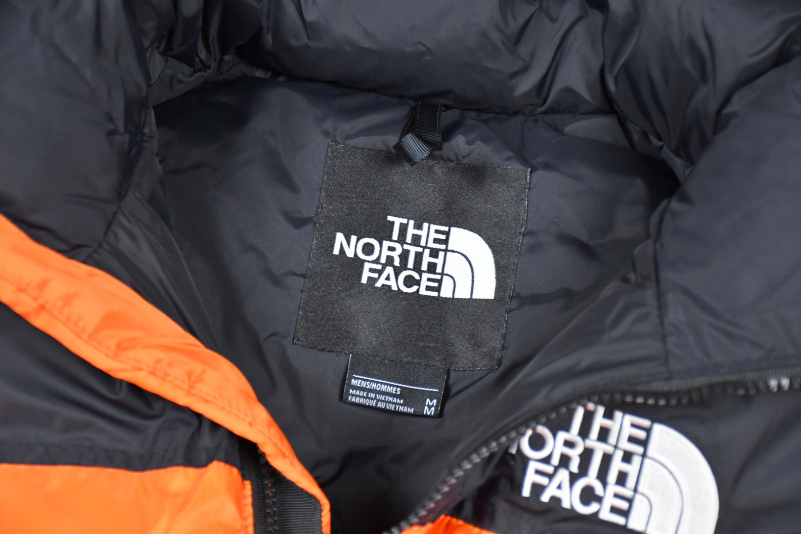 the n0*h f**e t*f  1996 down jacket orange