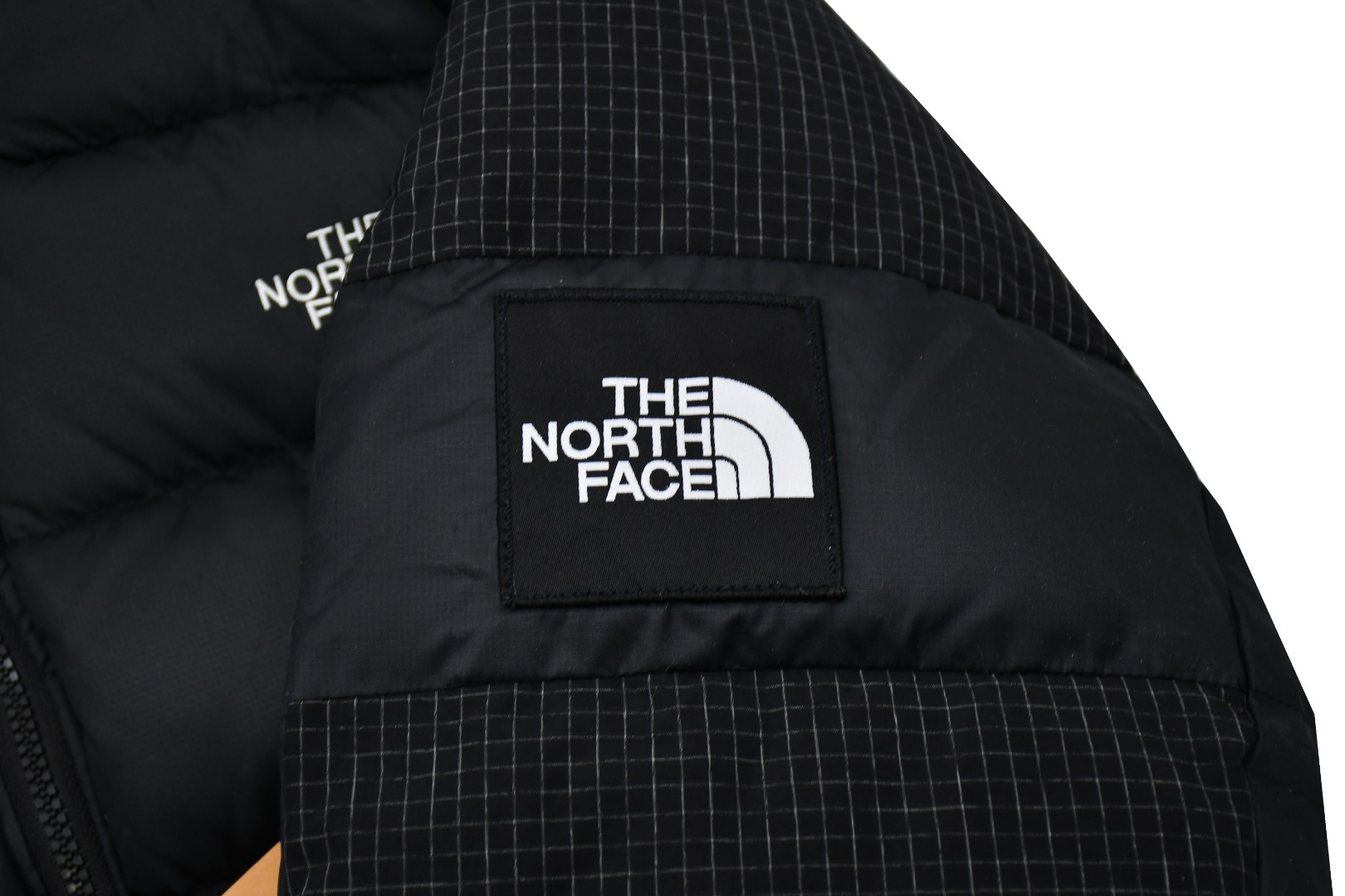 the n0*h f**e t*f padded high collar jacket