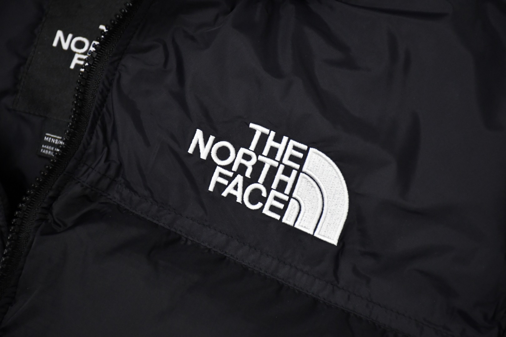 the n0*h f**e t*f  1996 down jacket black