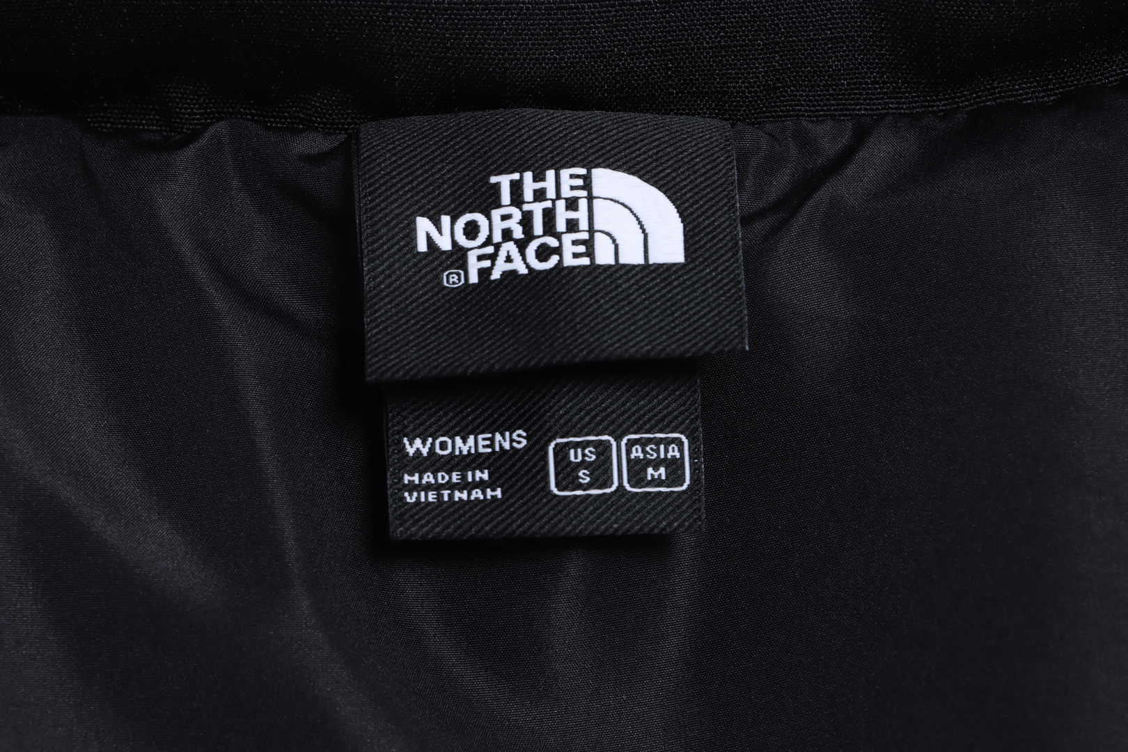 the n0*h F**e splicing contrast color large pocket functional down jacket