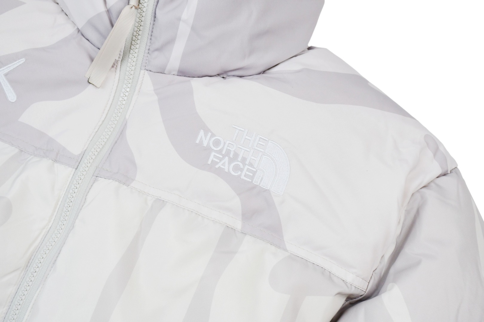 kaws x the n0*h f**e t*f  1996 down jacket