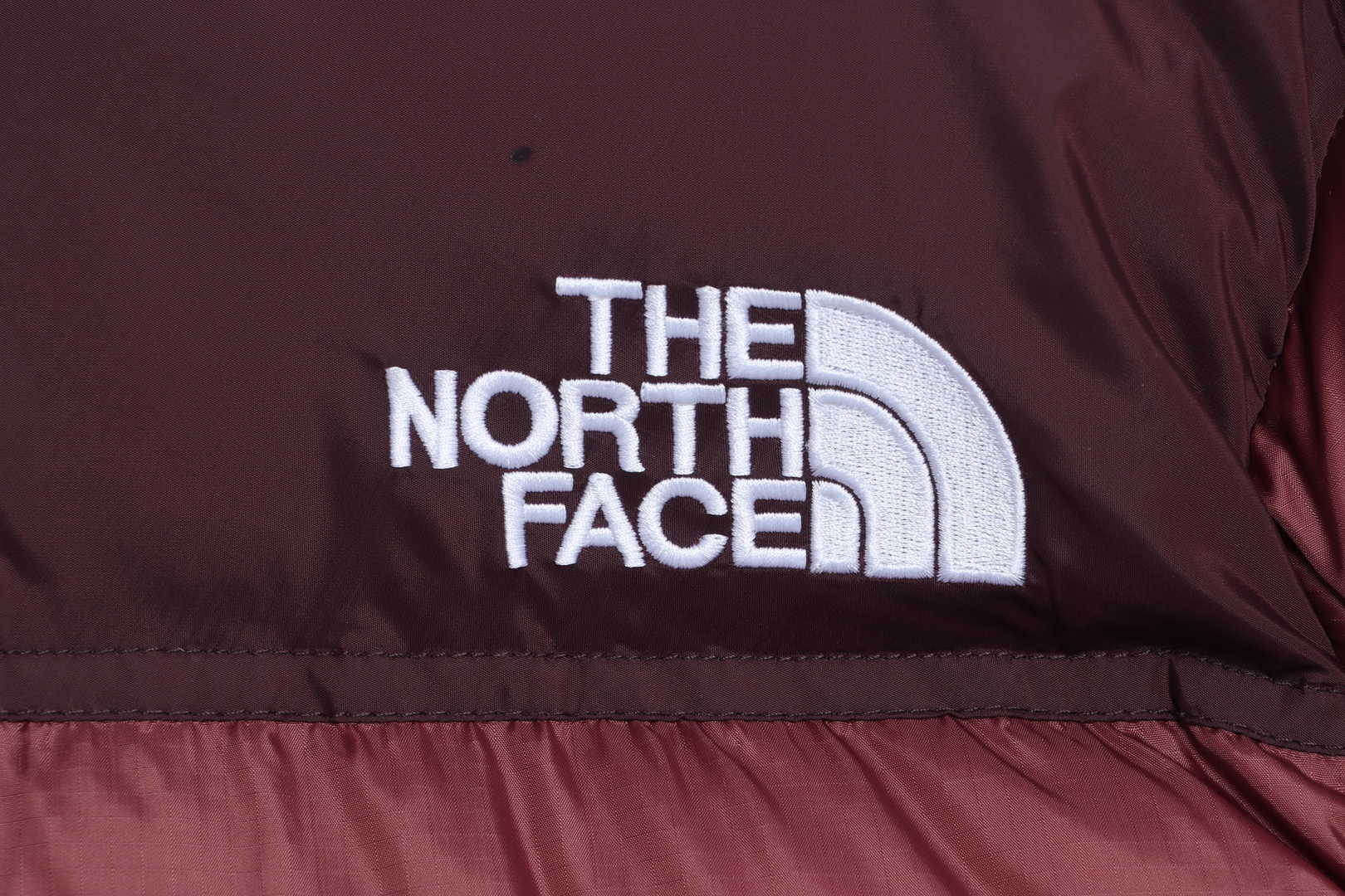 the n0*h F**e 96 red-brown down jacket