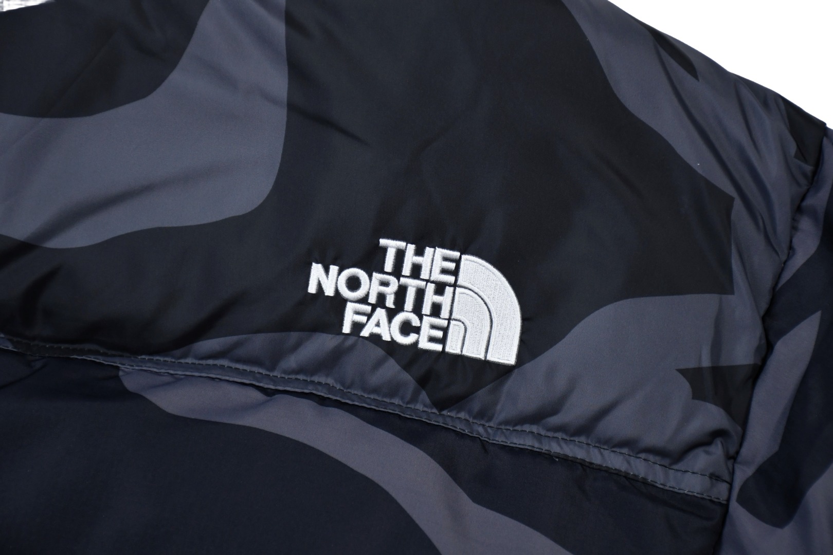 kaws x the n0*h f**e t*f  1996 down jacket