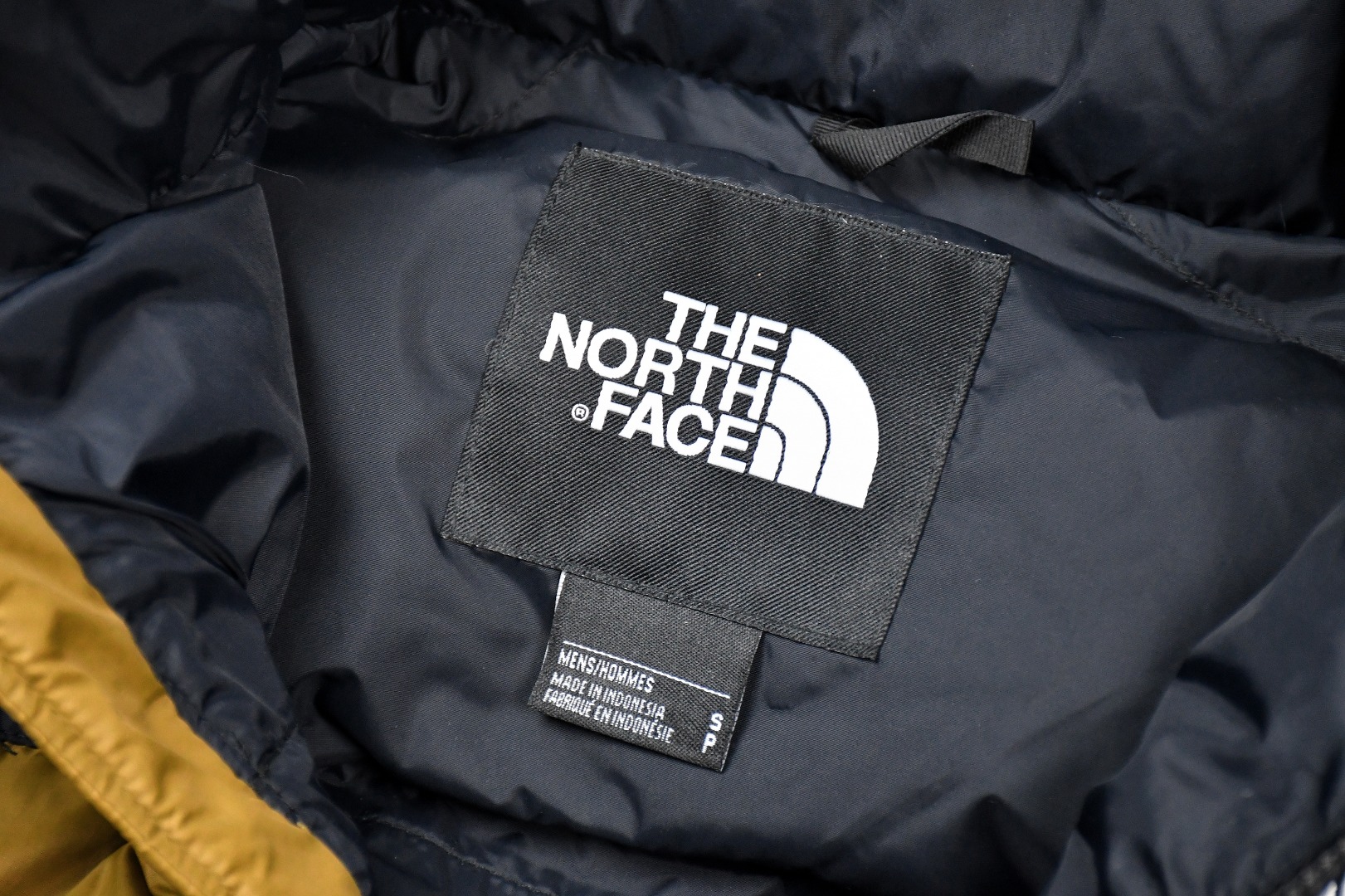 the n0*h f**e t*f  1996 down jacket gold