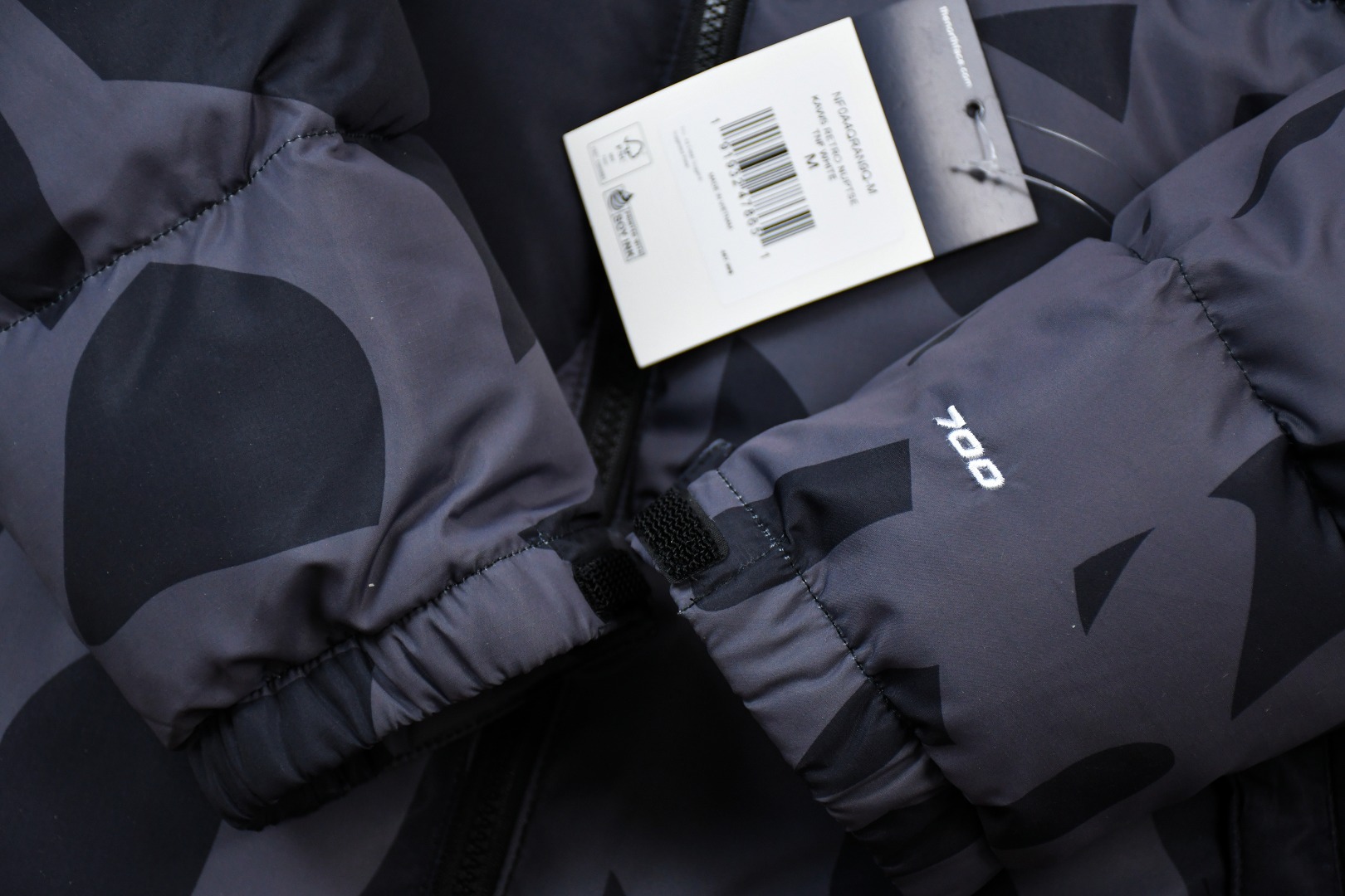 kaws x the n0*h f**e t*f  1996 down jacket