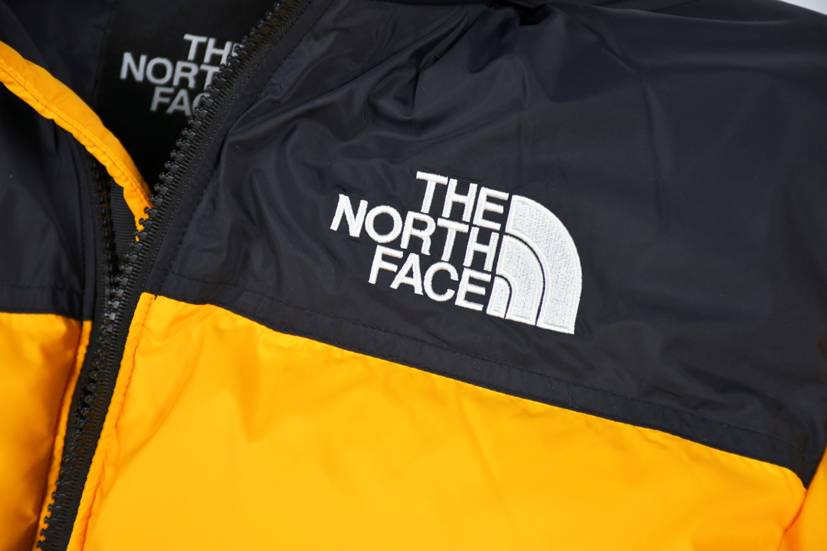 the n0*h f**e t*f  1996 down jacket yellow