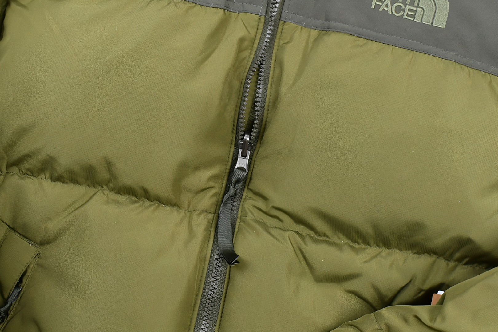 the n0*h f**e t*f  1996 down jacket army green